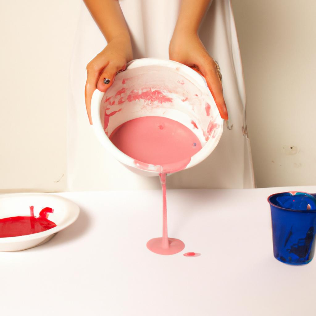 Person mixing paint in studio