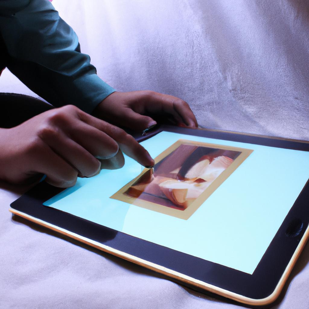 Person painting on digital tablet