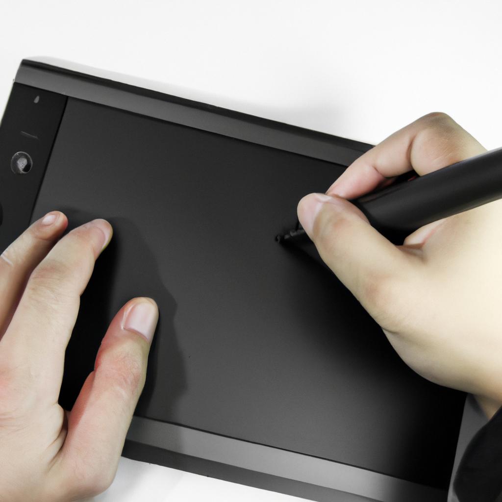 Person using digital drawing tablet